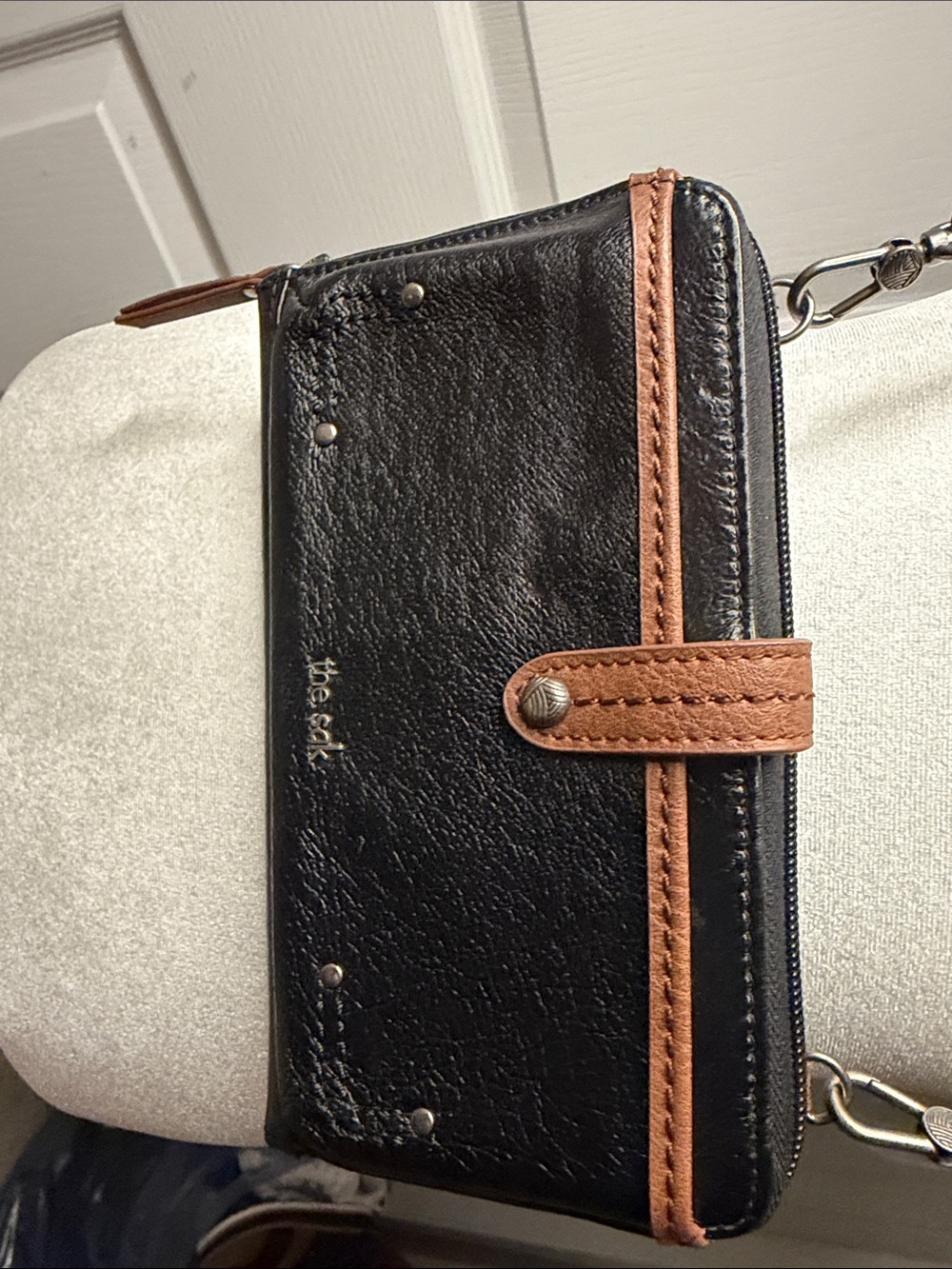 The Sak Black and Brown Leather Wristlet Wallet with Strap